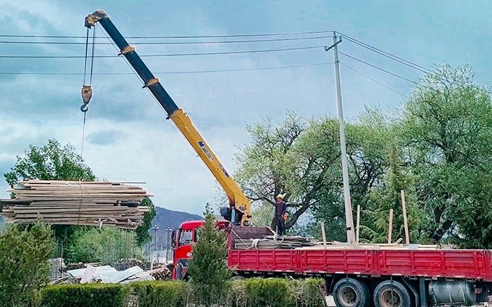 雪域高原高效作衣符器 不朽情缘随车起沉机助力西南工程建设